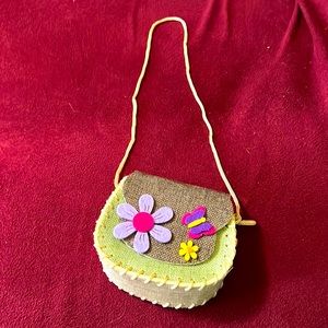 Decorated girl’s handbag all ages under 12.